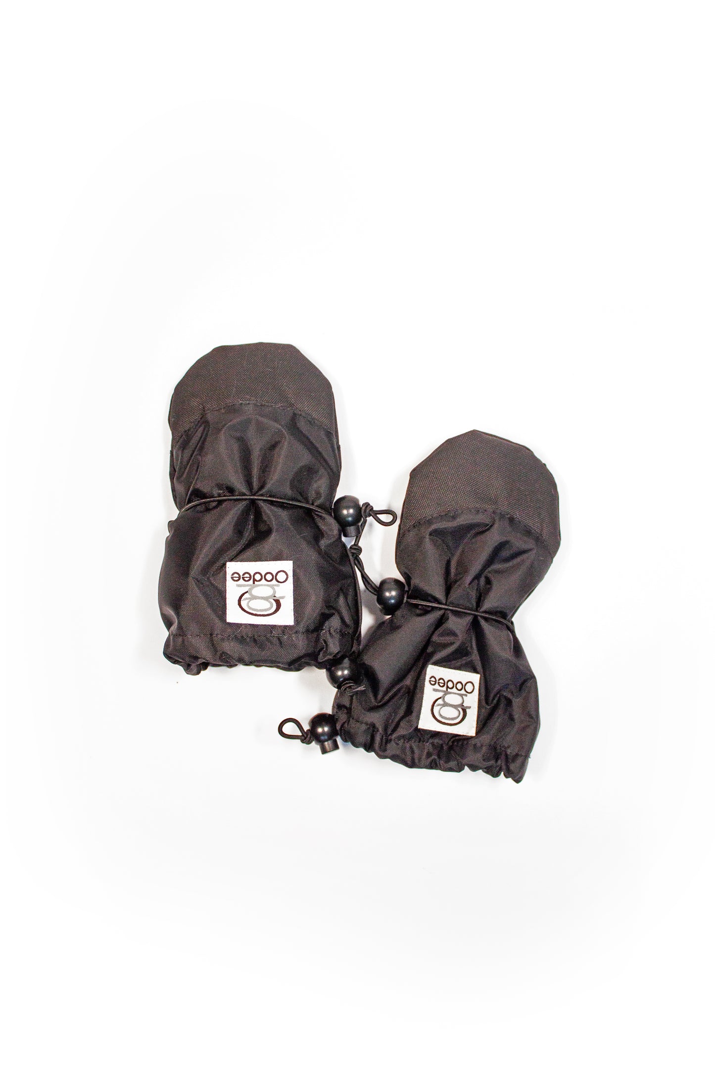 Black thumbless mittens inside Wolf